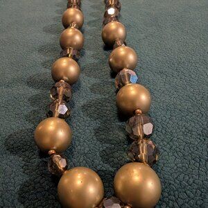 Rich deep interest, is a description of this vintage 32" Carolee necklace,